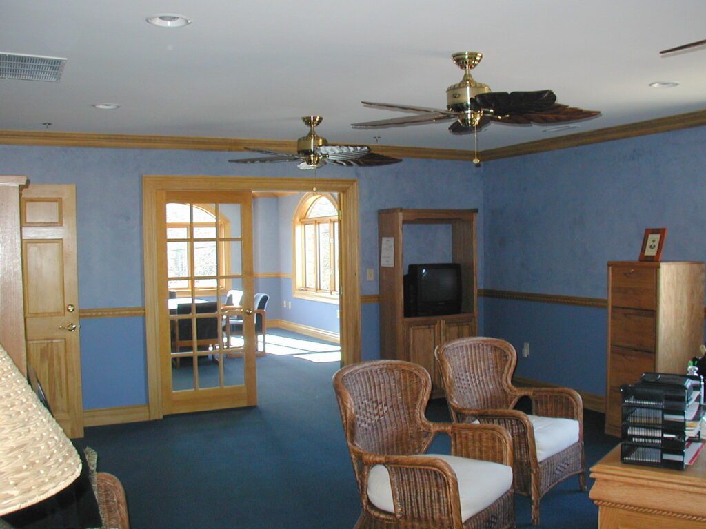 Office and seating area with french doors at Resinart in Fletcher, NC