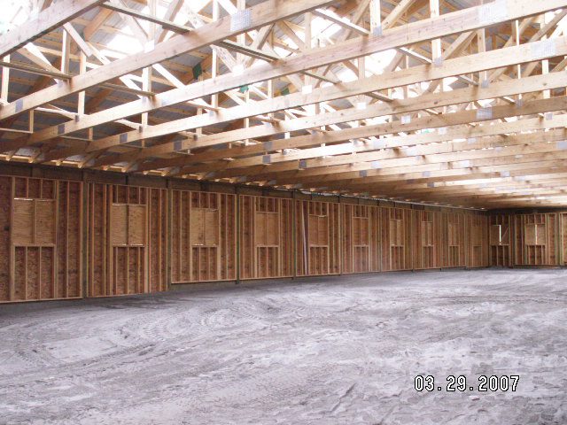 Fully framed riding arena interior built by Cool Mountain Construction