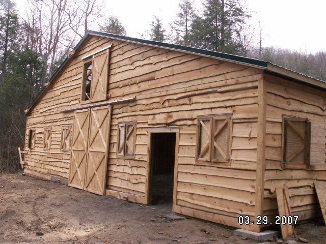 Rough Cut Lumber Exterior On Finished Riding Arena In Fairview, NC
